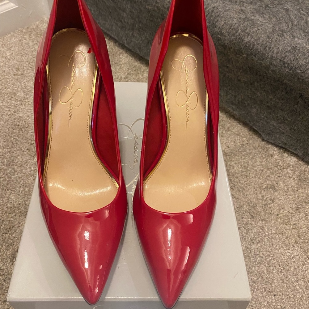 Jessica Simpson Patent Leather Red Pumps. Size 9. Worn a couple of times .